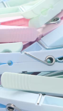 a pile of colored clothespins of delicate colors rotates in a circle a pile of colored clothespins of delicate colors rotates in a circle household items clothespins