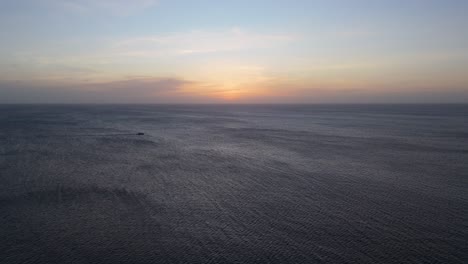 sunset with june clouds at eagle beach, aruba