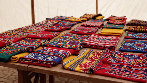 colorful textiles displayed at a market