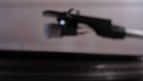 the needle dropping on a vintage classic vinyl record player.