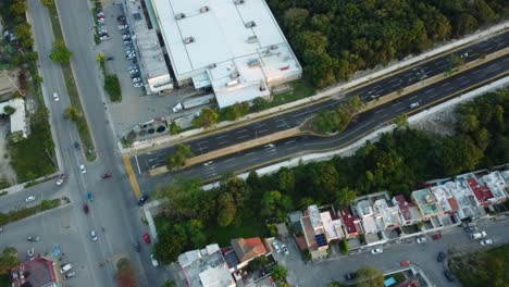 Aerial-view-of-streets-and-roads-during-the-sunset-in-Playa-del-Carmen,-Mexico