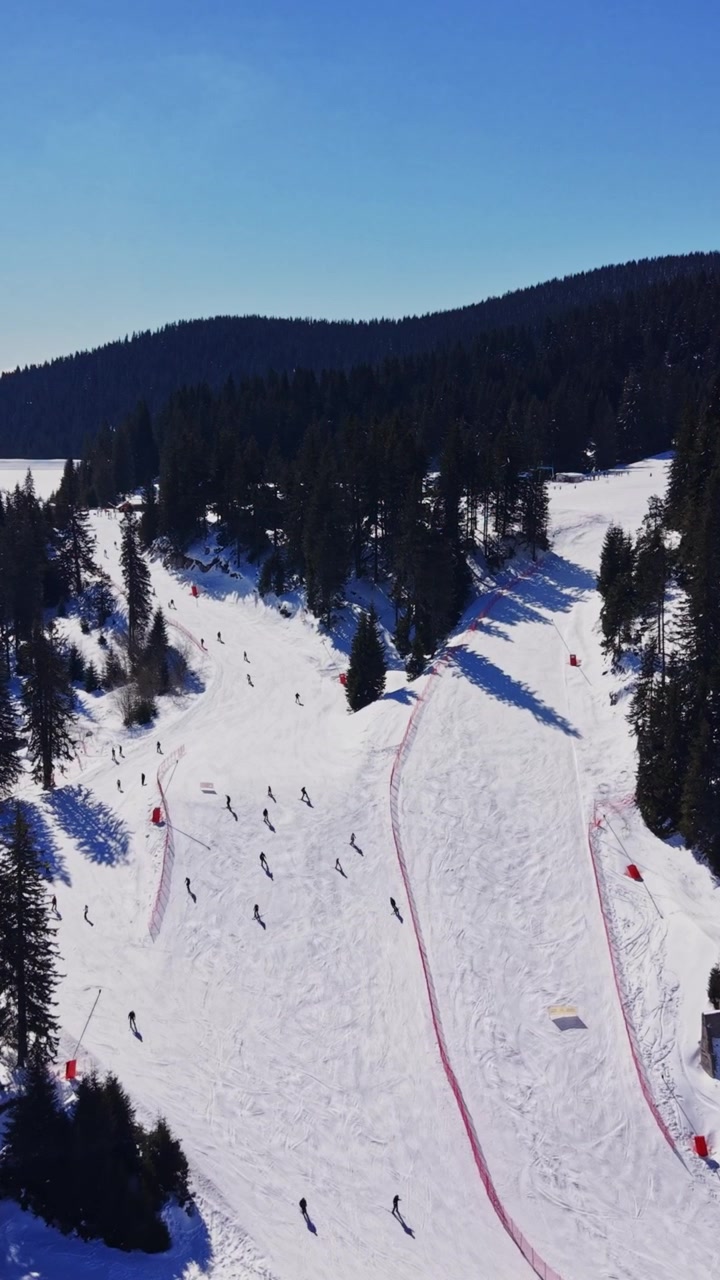 Winter sports activities in the Carpathians, Bulgaria on a sunny day