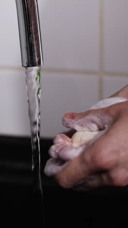 person washing hands