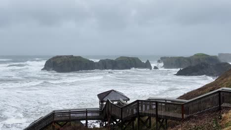 stairs leading to elephant head rock formation in bandon at the oregon coast