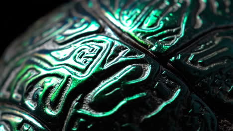 close-up of an iridescent green and blue organic texture