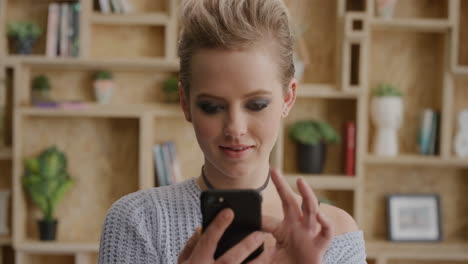 portrait cute young blonde girl using smartphone enjoying browsing online reading funny messages laughing satisfaction mobile technology real people series