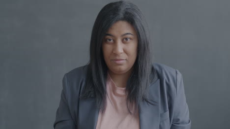 woman giving a thumbs down