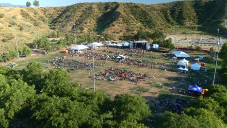 aerial view approaching the event area at the central park of santa clarita, usa