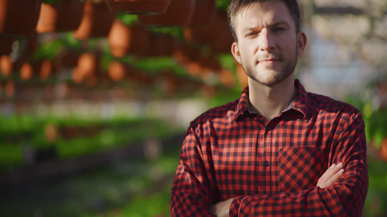 Success Gardener in Lush Greenhouse Portrait