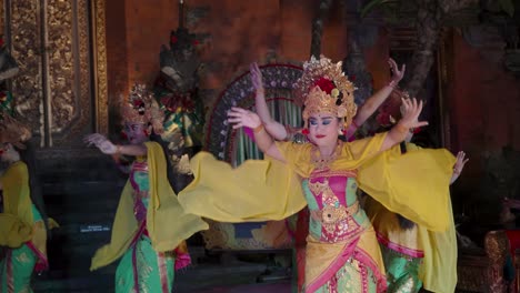 Group of Women Performers Dancing Legong and Ramayana Traditional Theater Dance Performance at Ubud Palace, Bali - close-up