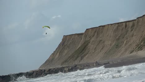 cliff with waves, north sea, jütland, holmsland klit, denmark, 4k