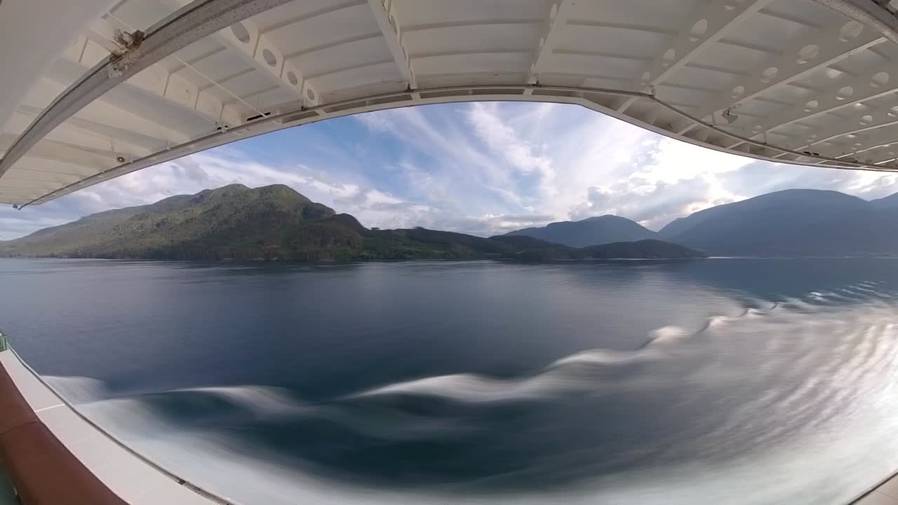 Sailing by Alaska's wilderness coastline - wide angle hyper lapse