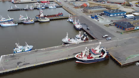 arial: fishing vessels at port in northern danmark