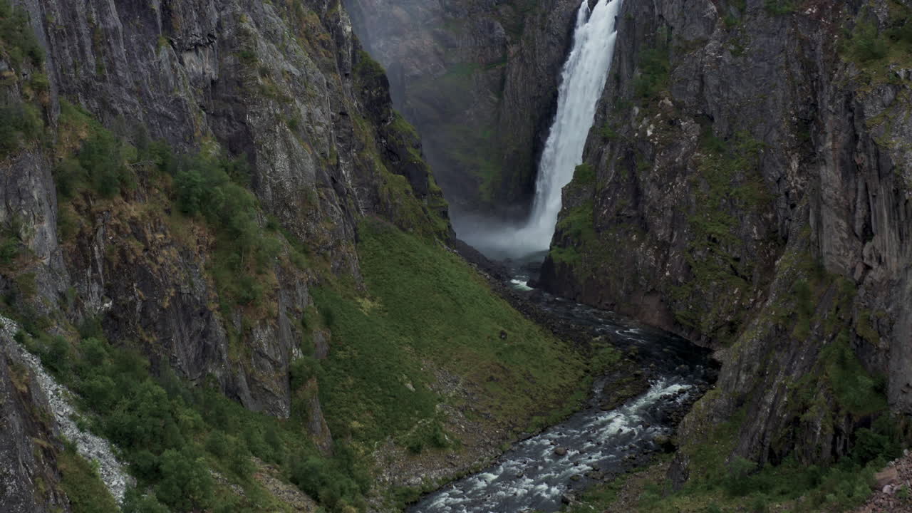 Dramatic Waterfall in a Mountain Canyon