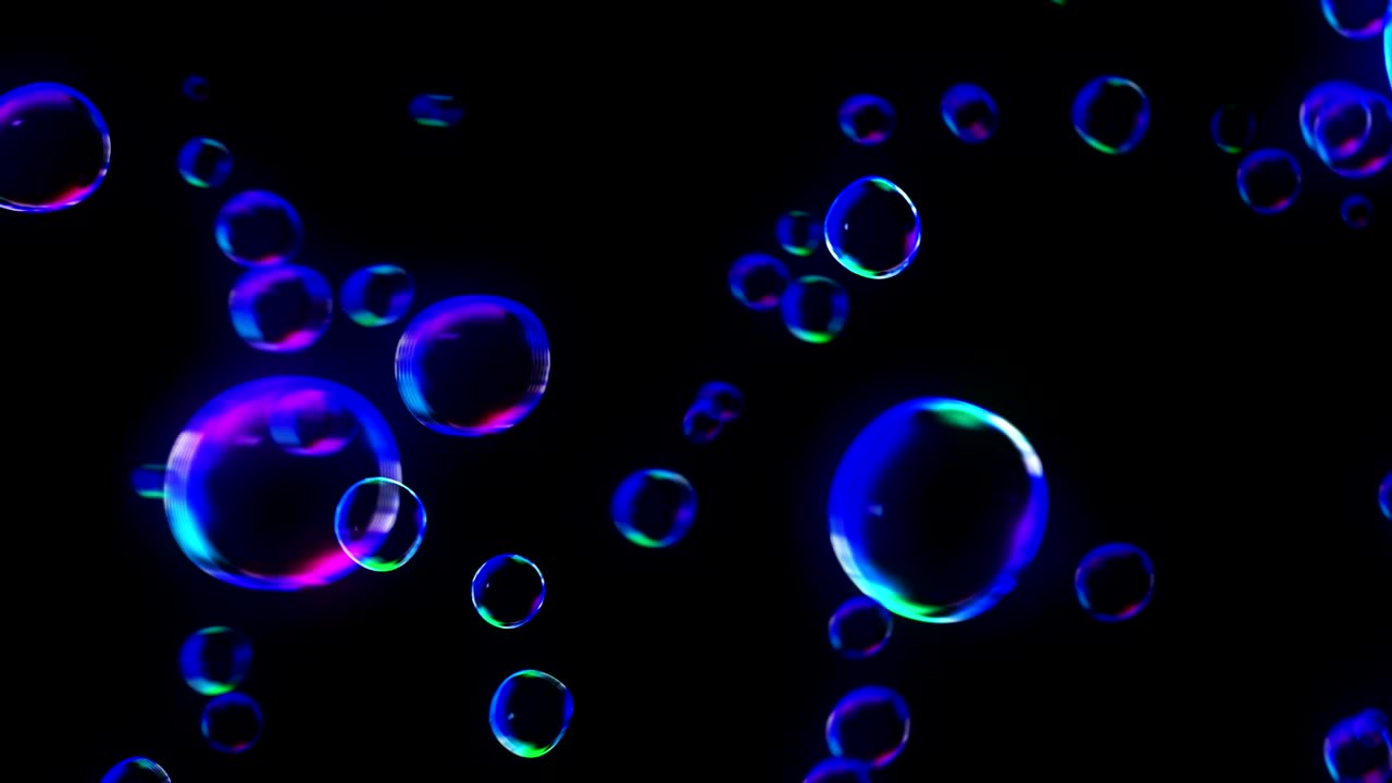 Rainbow bubbles on a dark background