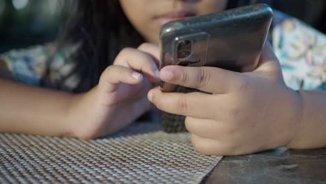 child using a smartphone