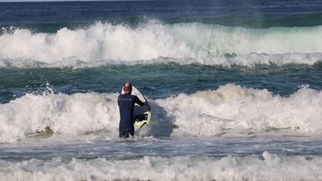 sequence of a surfer riding a wave to shore