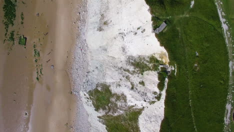 bird's view aerial footage, following a flying gull, shot at le petit blanc nez, escalles on the opal coast, france