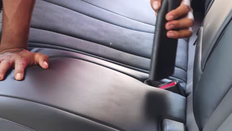 cleaning car seats with a handheld vacuum