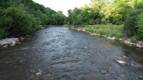 flying fast and close to running river