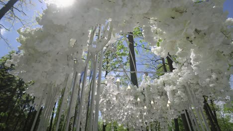 white wedding arch with chandeliers and candles 02