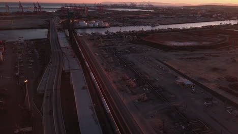 breathtaking golden sunset over the road and railways