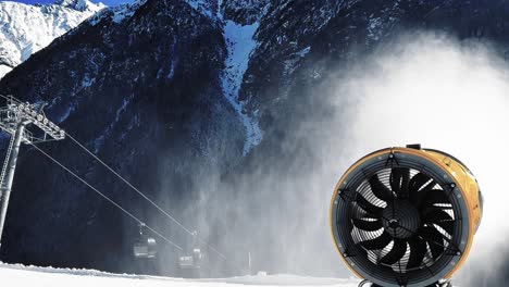 Watching-the-turbines-spin-on-snow-making-machine-as-skier-passes-through-cloud