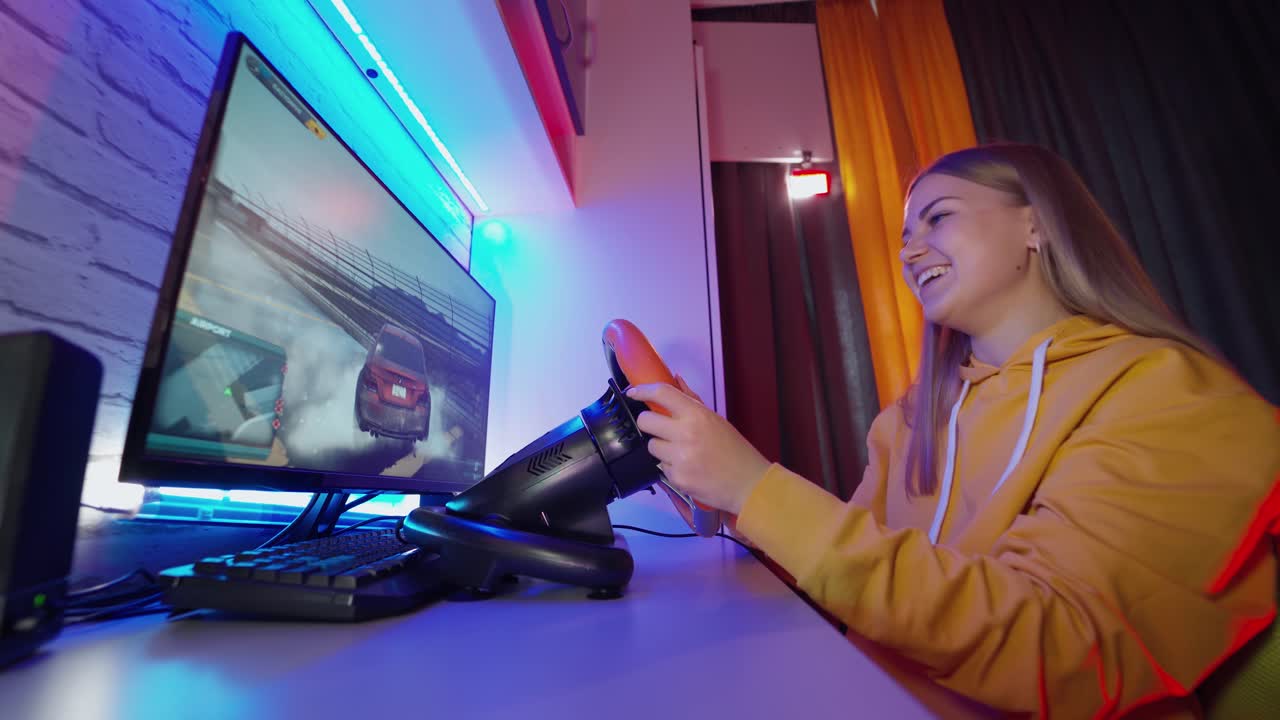 Girl playing video game. Teenage girl playing driving simulator game