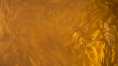 fondo de onda de oro líquido