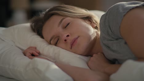 close up of caucasian woman sleeping in the bed