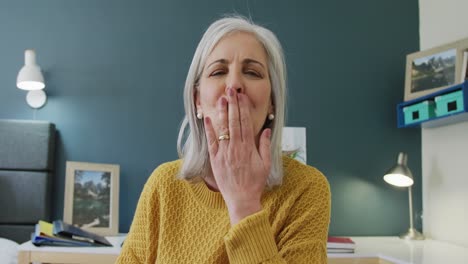 portrait of happy senior caucasian woman kissing