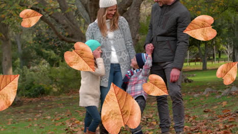 animation of autumn leaves falling over happy caucasian family in park