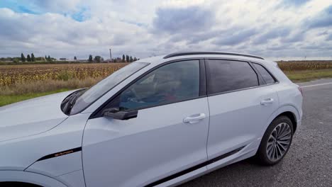 VINNITSA, UKRAINE - September 2019: Presentation of a white Audi e-tron, compact luxury crossover SUV. Modern new cars for sale