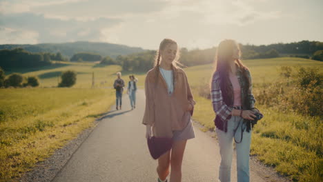 Woman-With-Friend-Photographing-Through-Camera-Near-Meadow