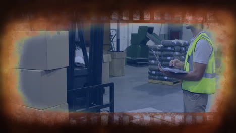 using laptop, warehouse worker managing logistics with animation over industrial background