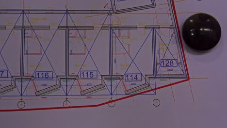a detailed close-up of a technical architectural drawing showing the floor plan and layout for a new apartment, illustrating the design and construction phase of a real estate development project