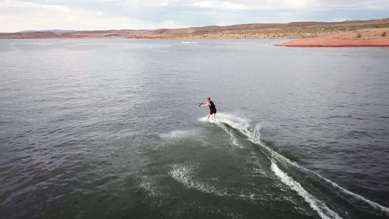Drone shot of wakeboard trick in Lake Powell Utah