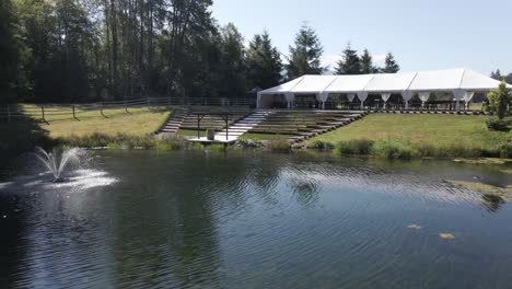 beautiful vintage farm in the middle of the forest with a lake and a fountain