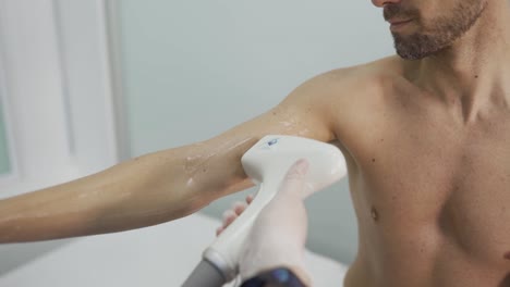 laser epilation and cosmetology in beauty salon. cosmetology, spa and hair removal concept