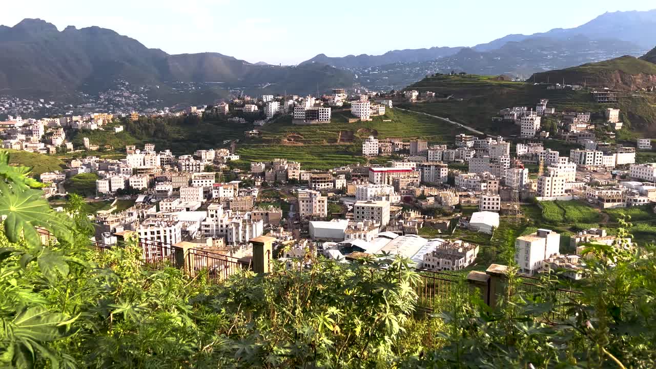 Ibb city pan top-down view of green city in Yemen