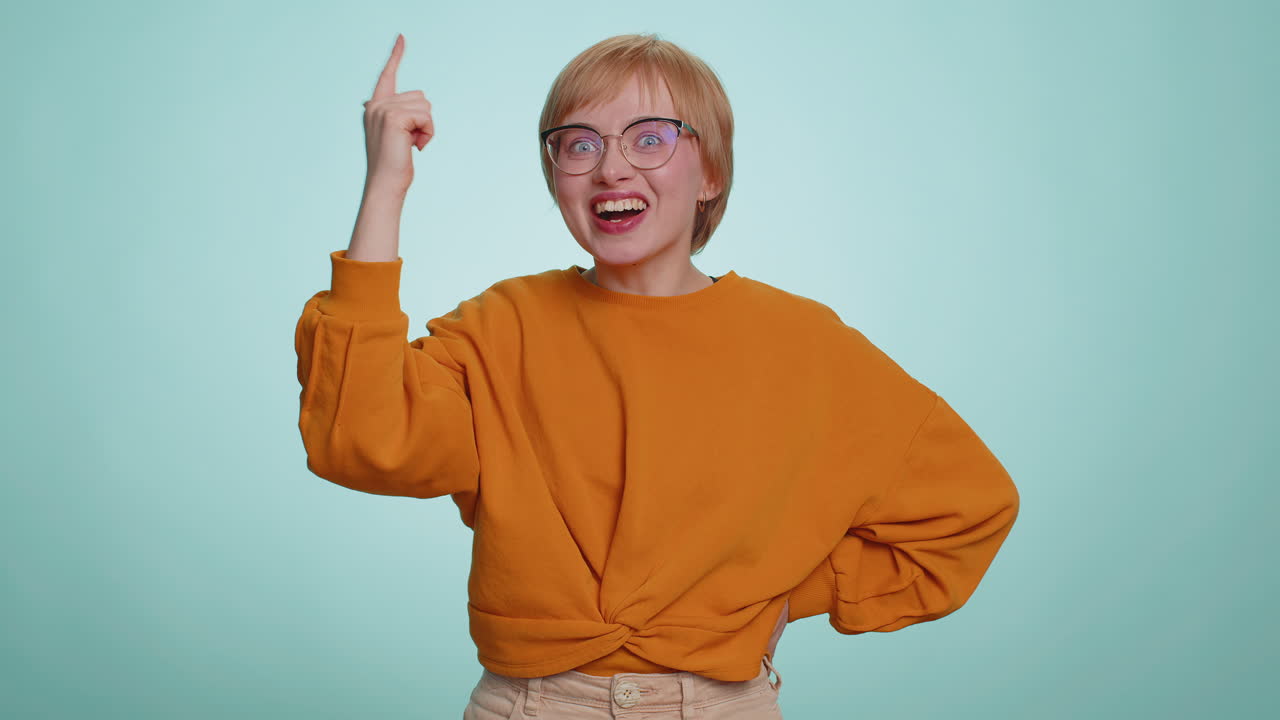 Inspired woman having good idea plan startup showing inspiration motivation eureka gesture