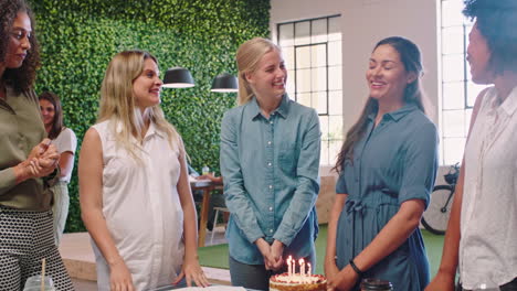birthday, cake and party with a business woman