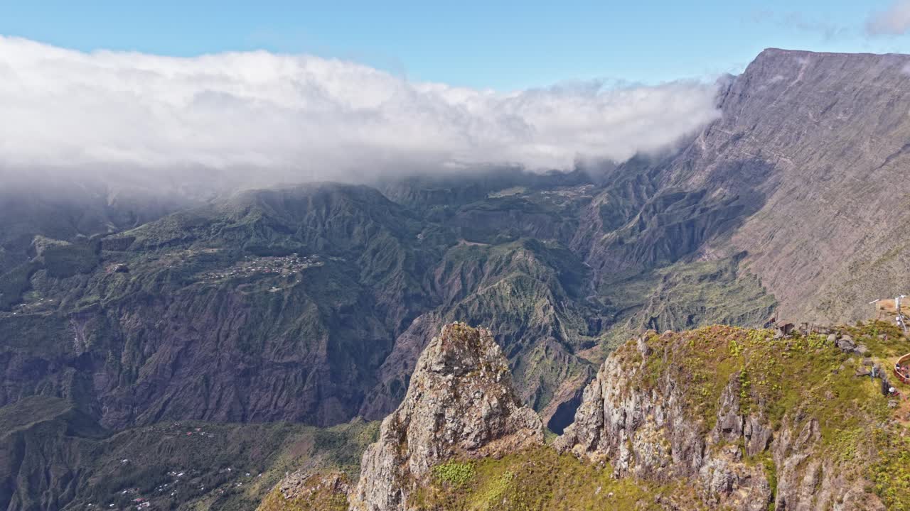 Maido, Mafate cirque, Reunion, view of the valley covered with clouds, droneshot, aerial