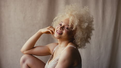 Studio-Portrait-Shot-Of-Confident-Natural-Albino-Woman-In-Underwear-Promoting-Body-Positivity