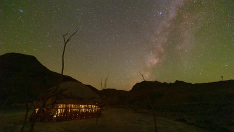 the milky way sets over a native house in iran