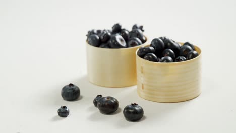 Blueberries-in-bowl-placed-on-white-background-4K-4k