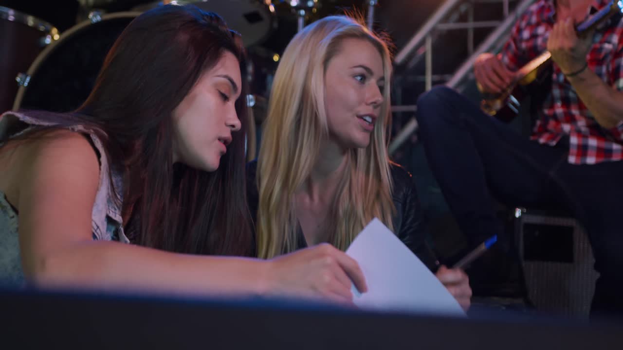 Musicians discussing together before performing | Premium Stock Video ...