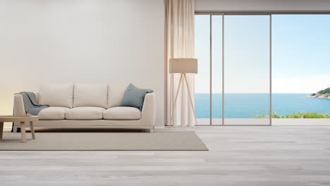 beige sofa near blank wall on empty wooden floor of large living room in modern house or luxury hotel.