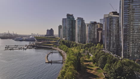 vancouver bc canada aerial v88 drone flyover waterfront promenades towards eastside shipyard capturing harbourfront downtown cityscape and landmark buildings - shot with mavic 3 pro cine - july 2023