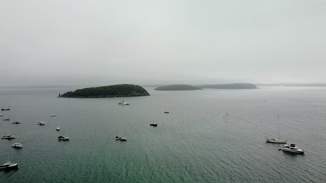 Aerial-shot-of-many-boats-and-yachts-moored-in-the-water